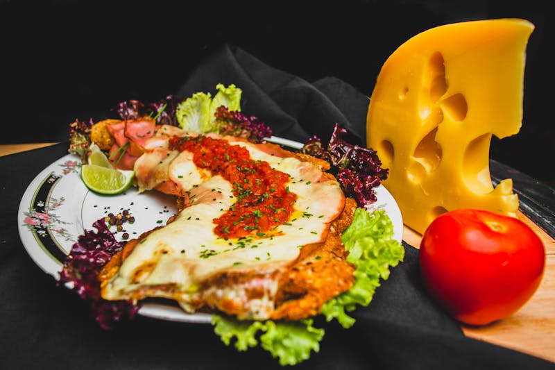 Garlic bread with melted cheese and herbs